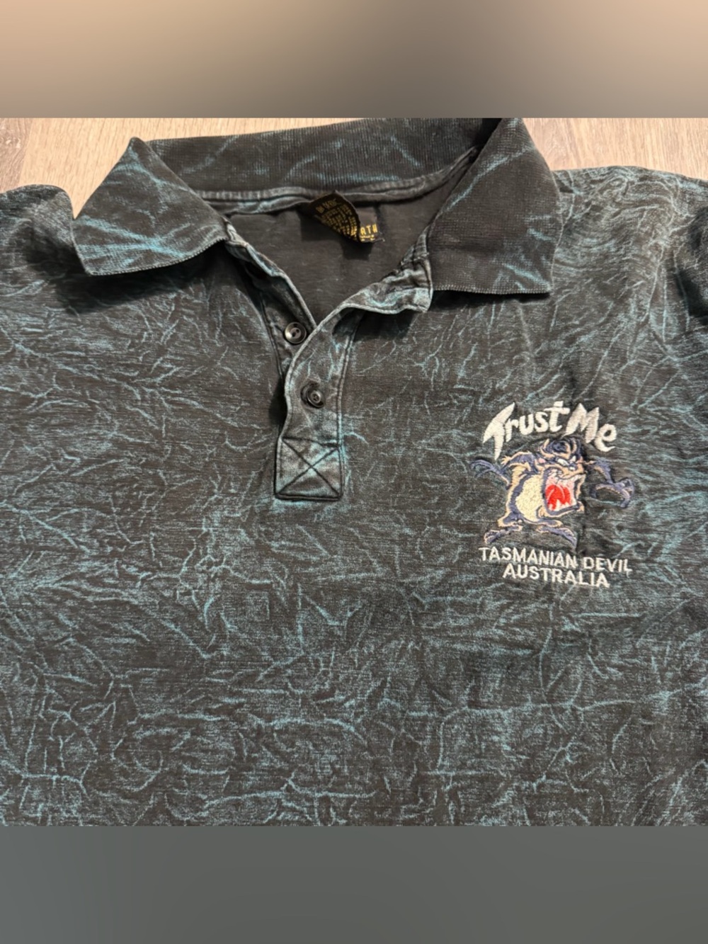 Tasmanian Devil 'Trust Me' Men's Polo Shirt - Black with Teal Wash